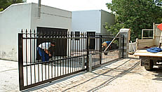 Electric Twin sliding gates and railings by our welders in ibiza