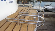 Stainless bathing platform with folding ladders 